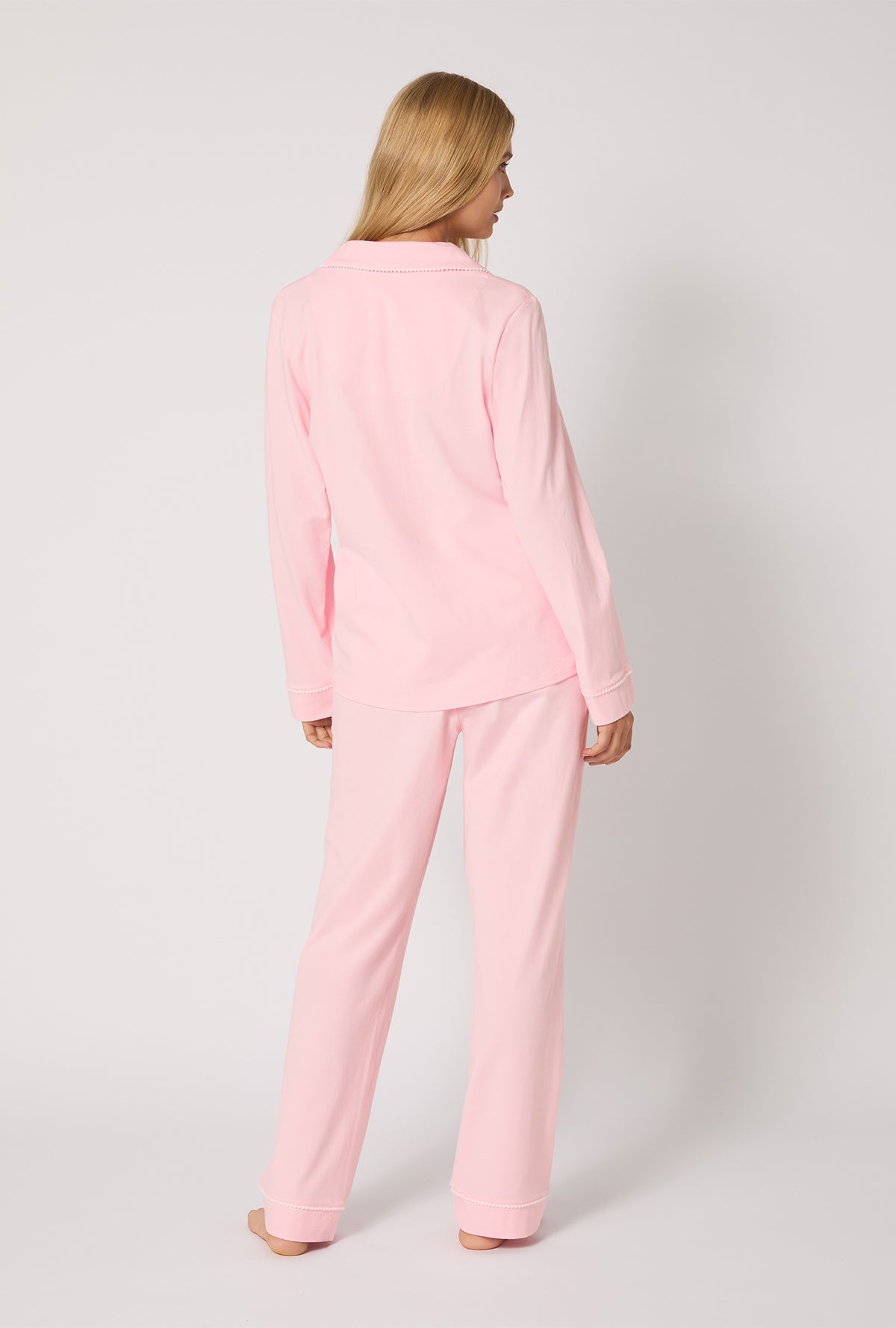 A lady wearing Pink Powder Long Sleeve Classic Stretch Jersey Pj Set