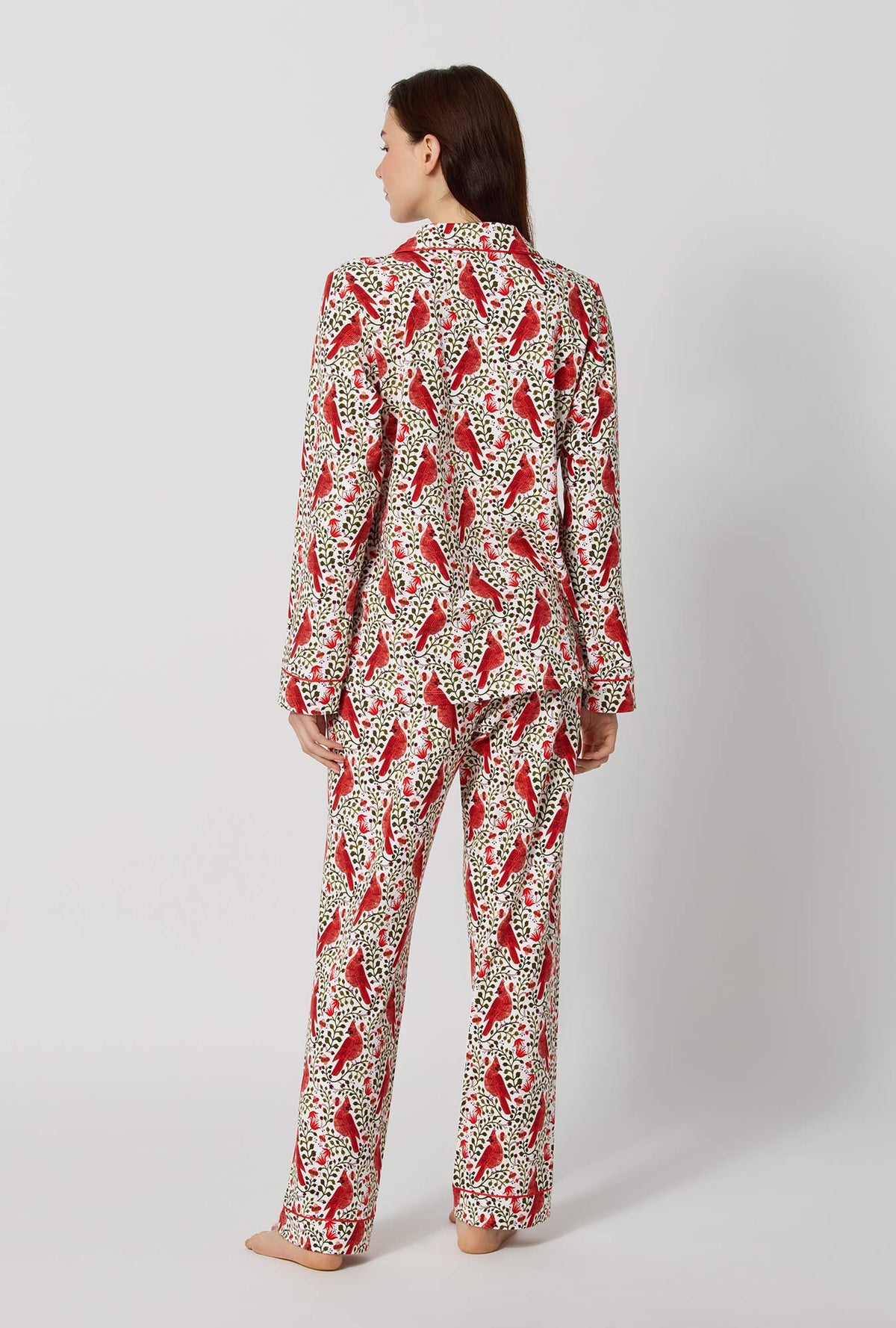 A lady wearing Rifle Paper Co. x BedHead PJs Cardinals Long Sleeve Classic Stretch Jersey Pj Set back view