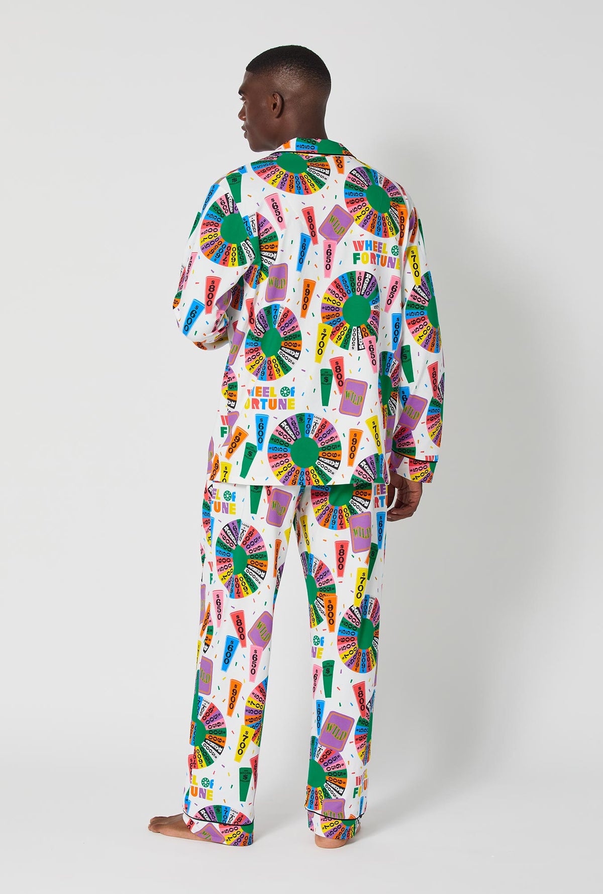 A man wearing Wheel Of Fortune Men&#39;s Long Sleeve Classic Stretch Jersey Pj Set