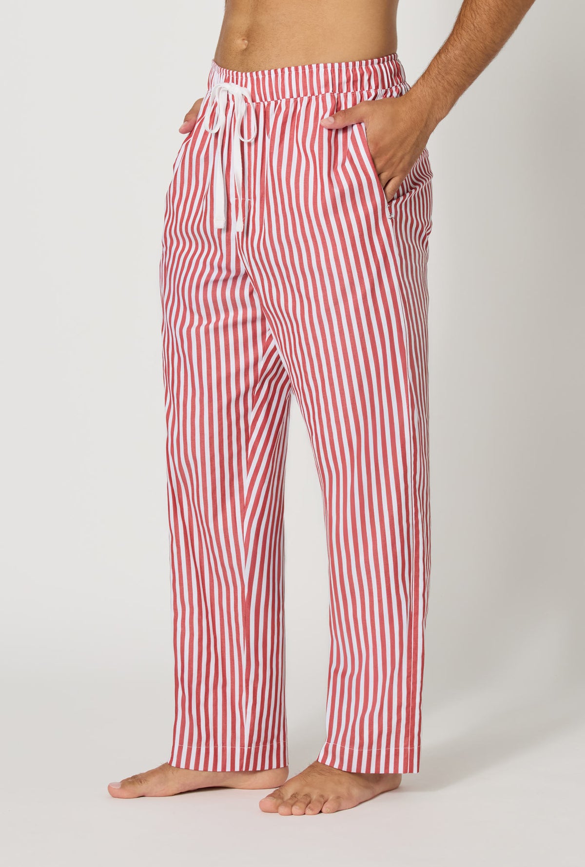 A man wearing Red Signature Stripe Men's Woven Cotton Sateen Pj Pant side view