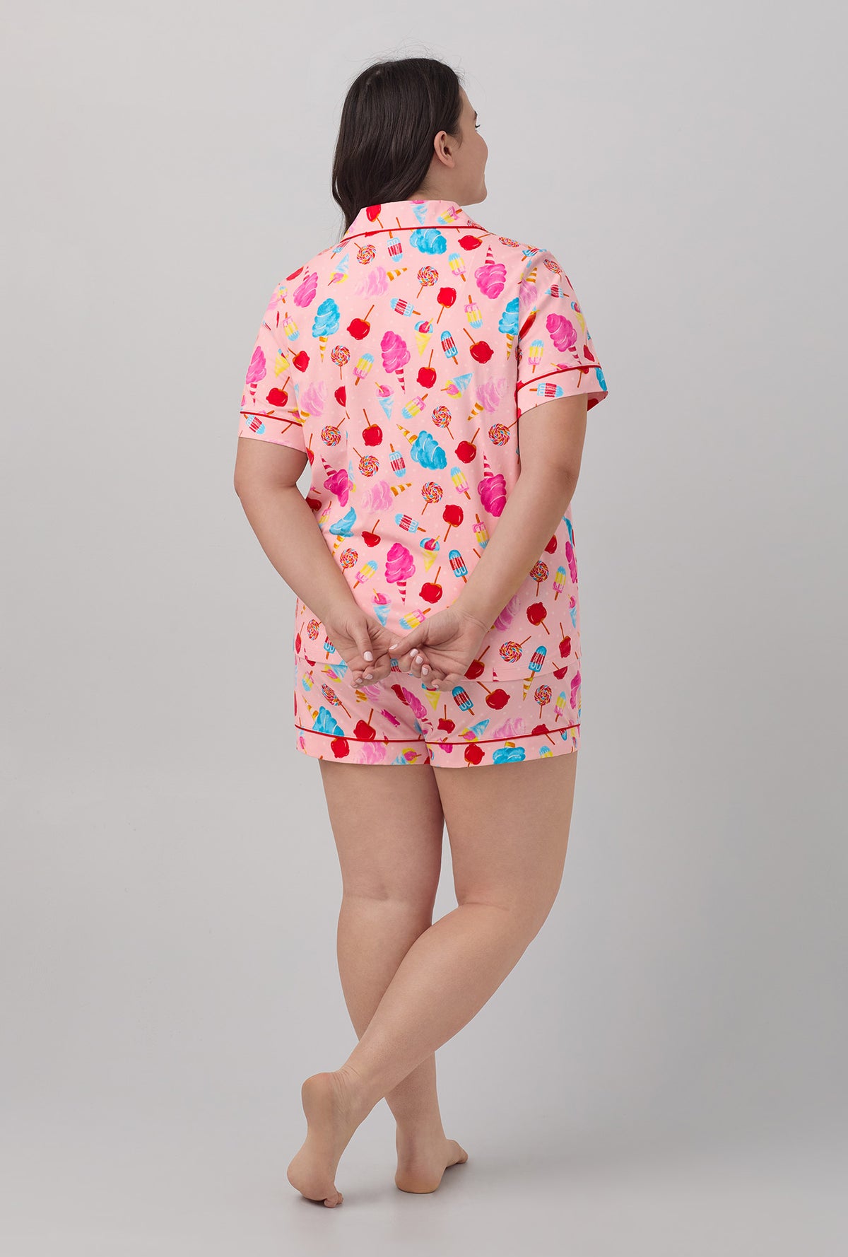 A lady wearing Short Sleeve Classic Shorty Stretch Jersey PJ Set with sweet treats print
