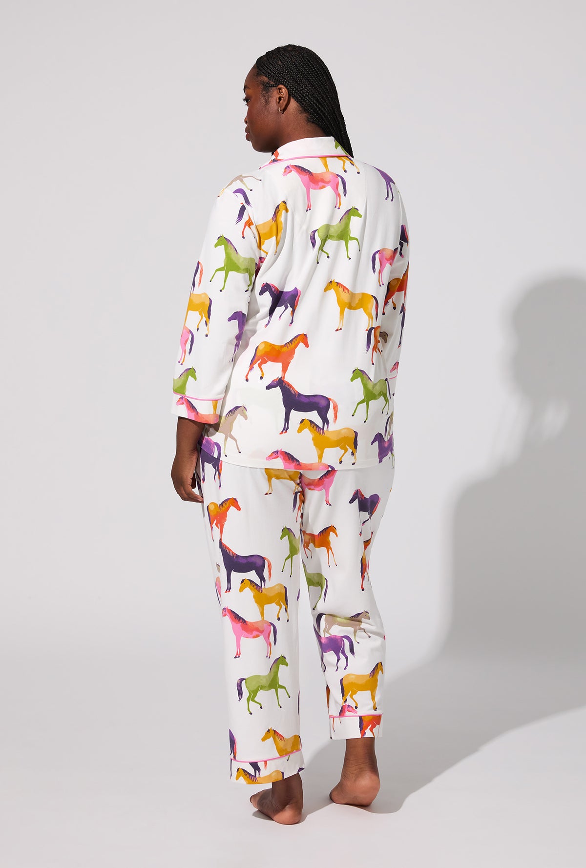 A lady wearing Equestrian Parade 3/4 Sleeve Classic Stretch Jersey Cropped PJ Set