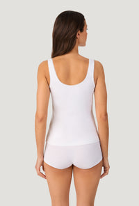 A lady wearing White Stretch Jersey Tank back view