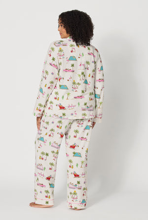 A lady wearing plus size Festive Flamingos Long Sleeve Classic Stretch Jersey Pj Set back view 