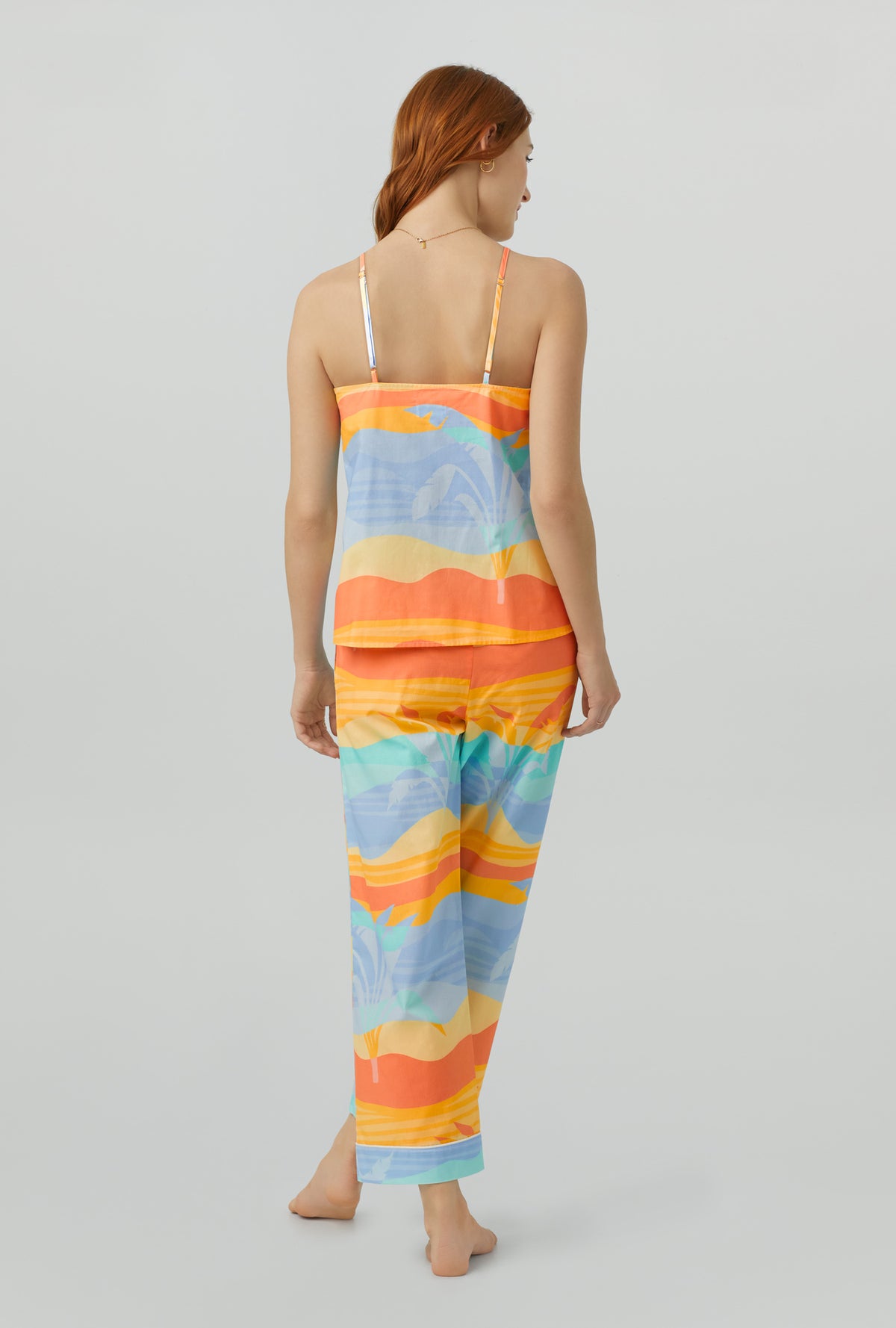 A lady wearing multi color Woven Cotton Poplin Cropped PJ Set with Desert Palms print