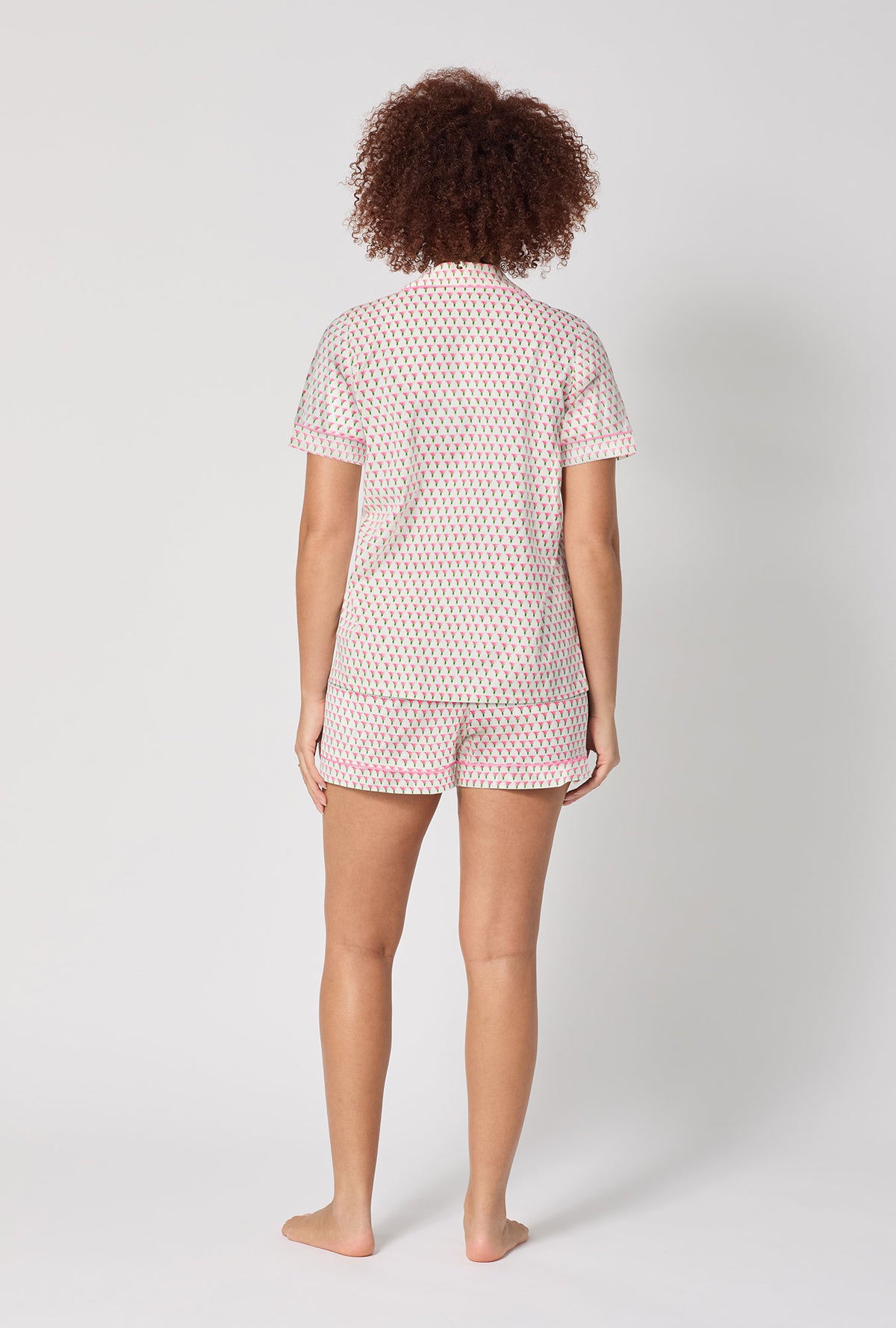 A lady wearing Blossom Geo Short Sleeve Classic Shorty Stretch Jersey Pj Set