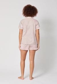 A lady wearing Blossom Geo Short Sleeve Classic Shorty Stretch Jersey Pj Set