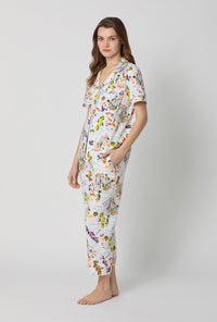 A lady wearing Blue Short Sleeve Classic Stretch Jersey Cropped Pj Set side view