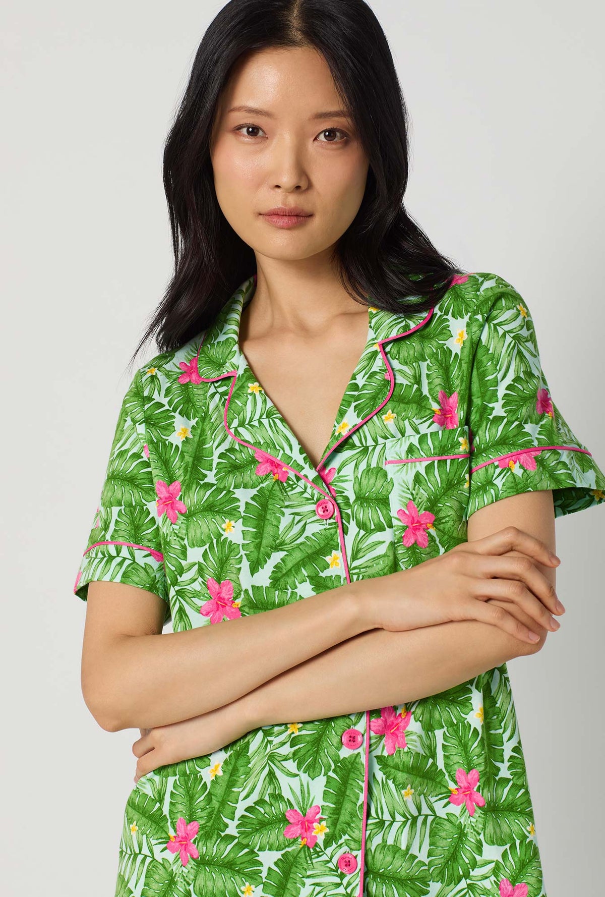 A Lady Wearing Monstera Bloom Short Sleeve Classic Stretch Jersey Cropped Pj Set facing front in a zoomed close up shot