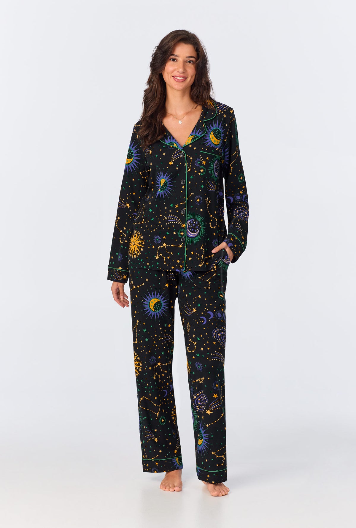 A lady wearing long sleeve classic stretch jersey long pj set with night sky print