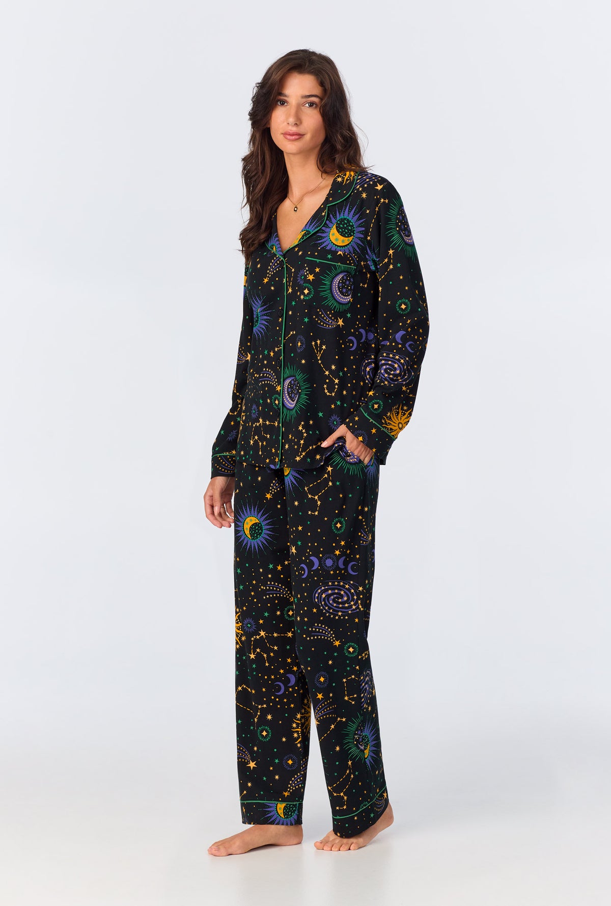 A lady wearing long sleeve classic stretch jersey long pj set with night sky print