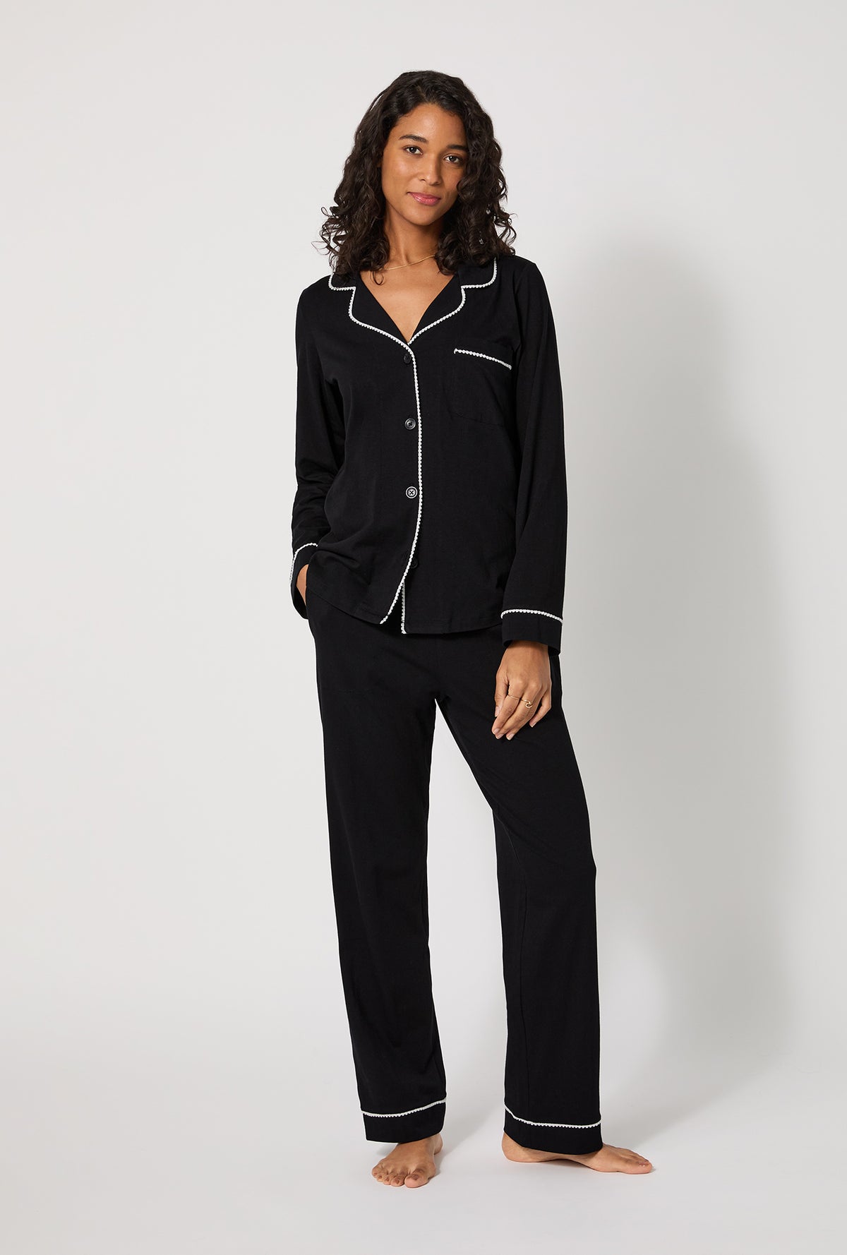 A lady wearing Black Beauty Long Sleeve Classic Stretch Jersey Pj Set