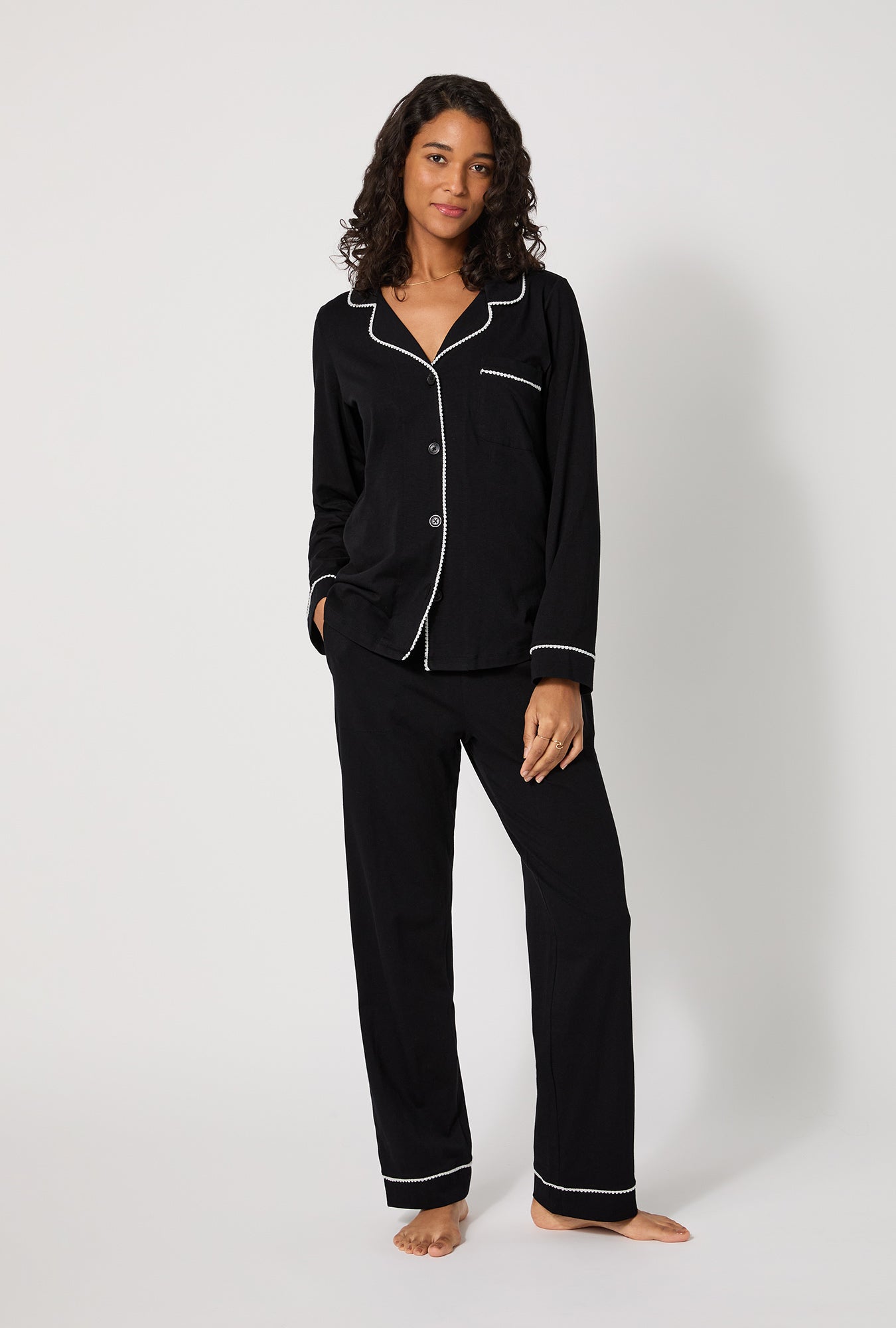 A lady wearing Black Beauty Long Sleeve Classic Stretch Jersey Pj Set
