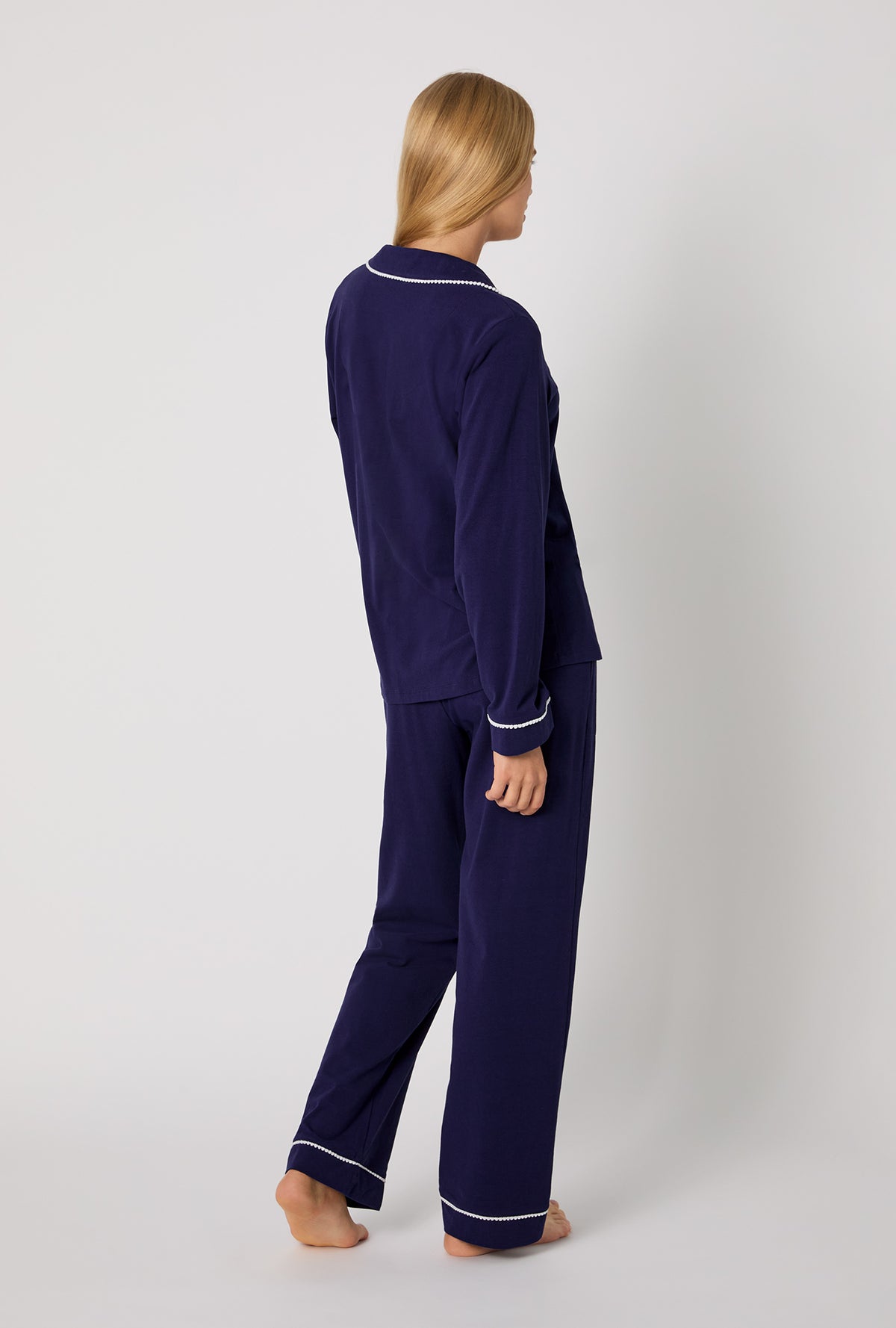 A lady wearing Midnight Navy Long Sleeve Classic Stretch Jersey Pj Set