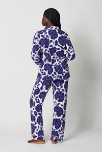 A lady wearing Blue and  White Long Sleeve Classic Stretch Jersey Pj Set back view
