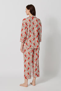 A lady wearing Rifle Paper Co. x BedHead PJs Cardinals 3/4 Sleeve Classic Stretch Jersey Cropped Pj Set back view
