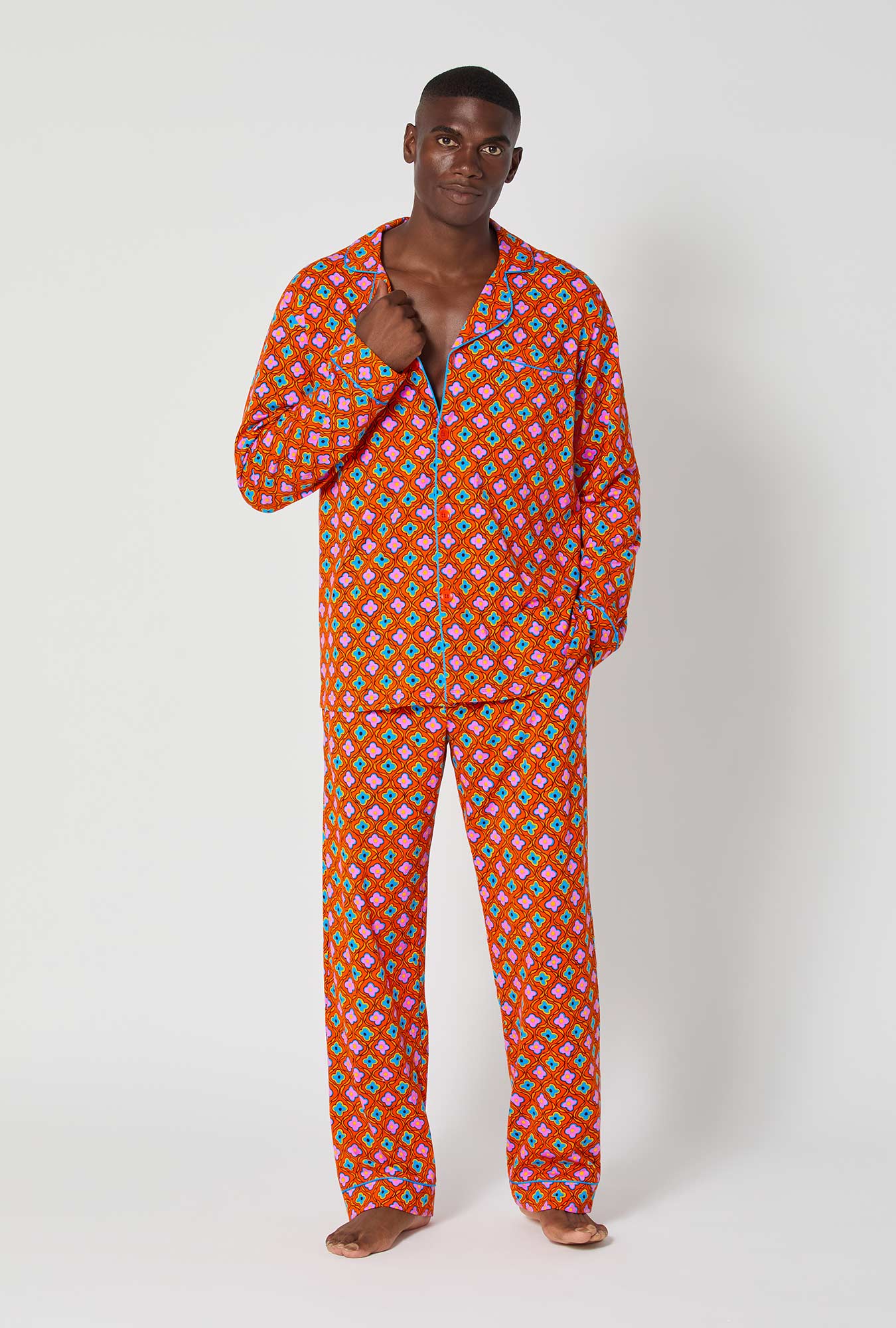 A man wearing BedHead x Mr. Turk Daisy Foulard Men's Long Sleeve Classic Stretch Jersey Pj Set
