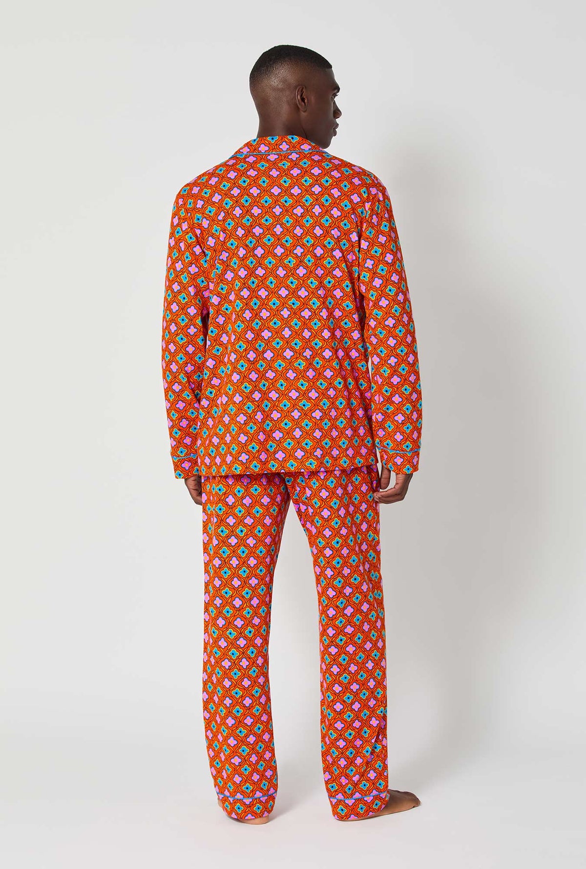 A man wearing BedHead x Mr. Turk Daisy Foulard Men&#39;s Long Sleeve Classic Stretch Jersey Pj Set