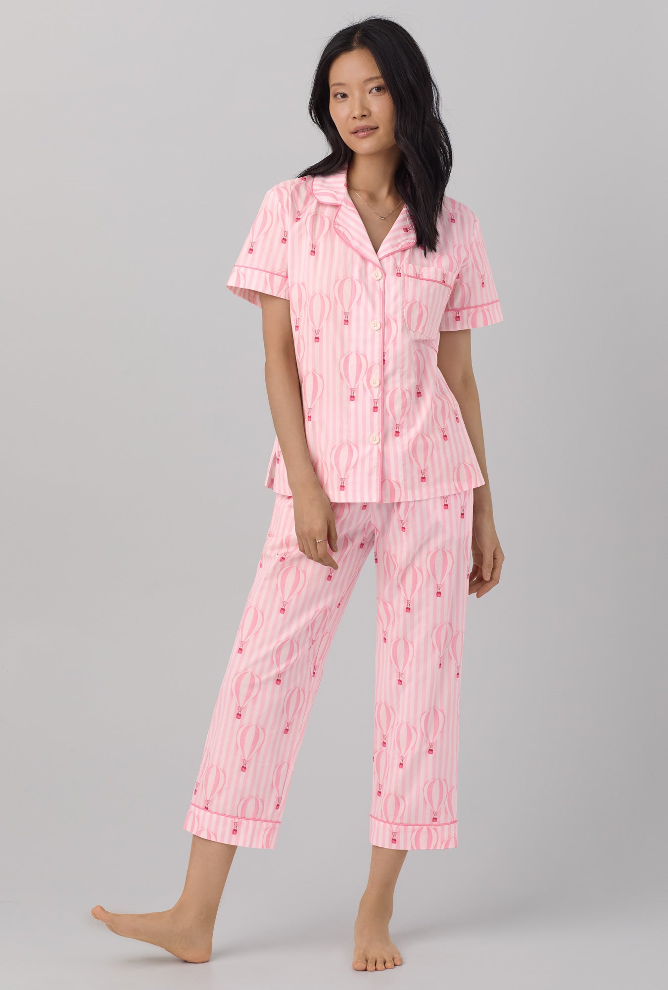 A lady wearing Short Sleeve Classic Woven Cotton Poplin Cropped PJ Set with balloon ride print