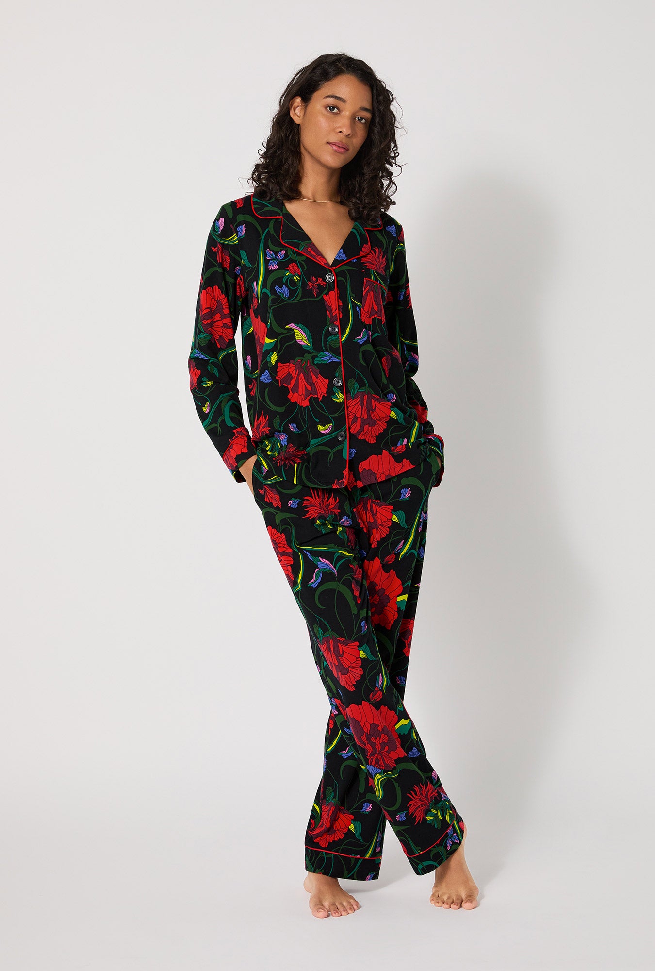 A lady wearing BedHead X Trina Turk Haute Floral Long Sleeve Classic Stretch Jersey Pj Set