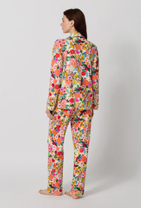 A lady wearing Rifle Paper Co. x BedHead PJs Garden Party Long Sleeve Classic Stretch Jersey Pj Set back view