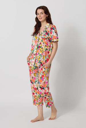 A lady wearing Rifle Paper Co. x BedHead PJs Garden Party Short Sleeve Classic Stretch Jersey Cropped Pj Set