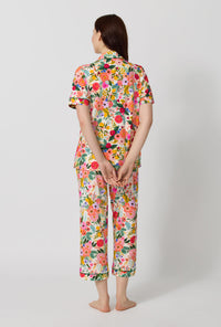A lady wearing Rifle Paper Co. x BedHead PJs Garden Party Short Sleeve Classic Stretch Jersey Cropped Pj Set back view