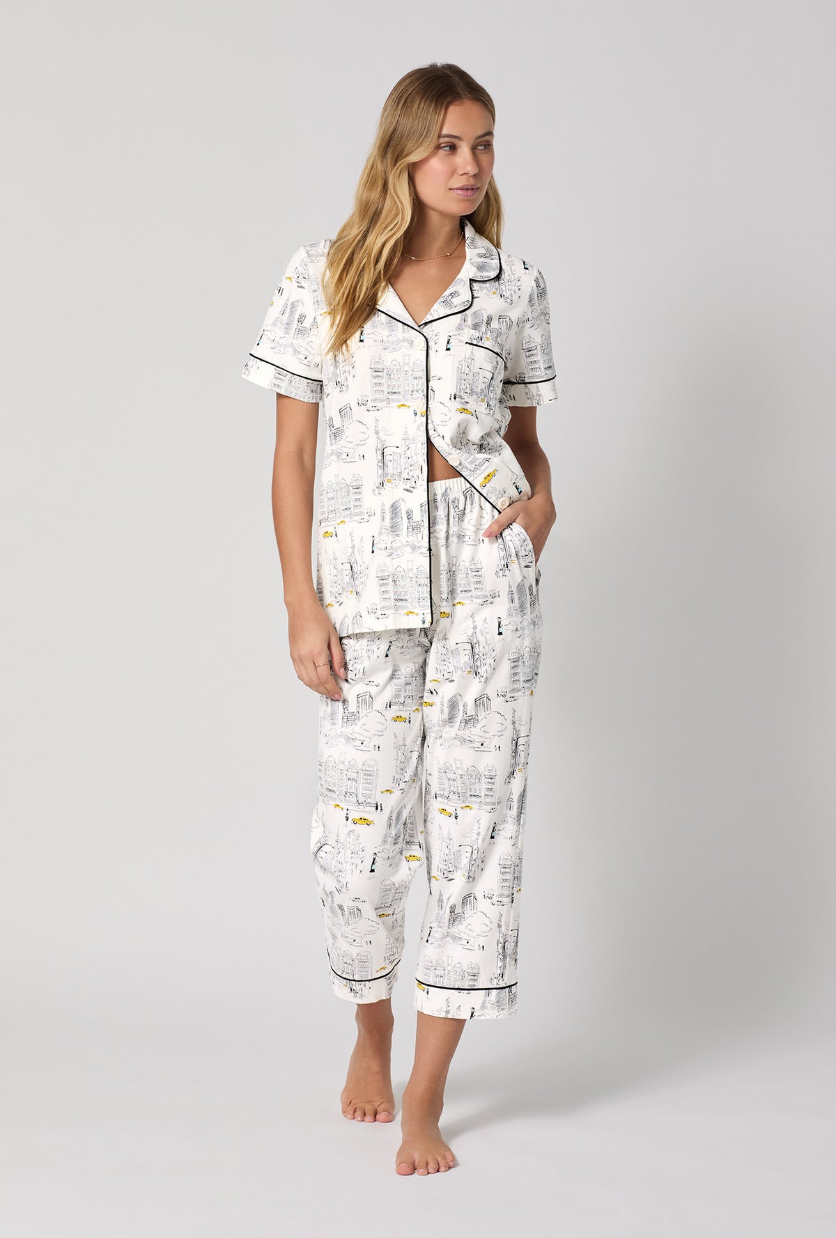 A lady wearing City That Never Sleeps Short Sleeve Classic Stretch Jersey Cropped PJ Set