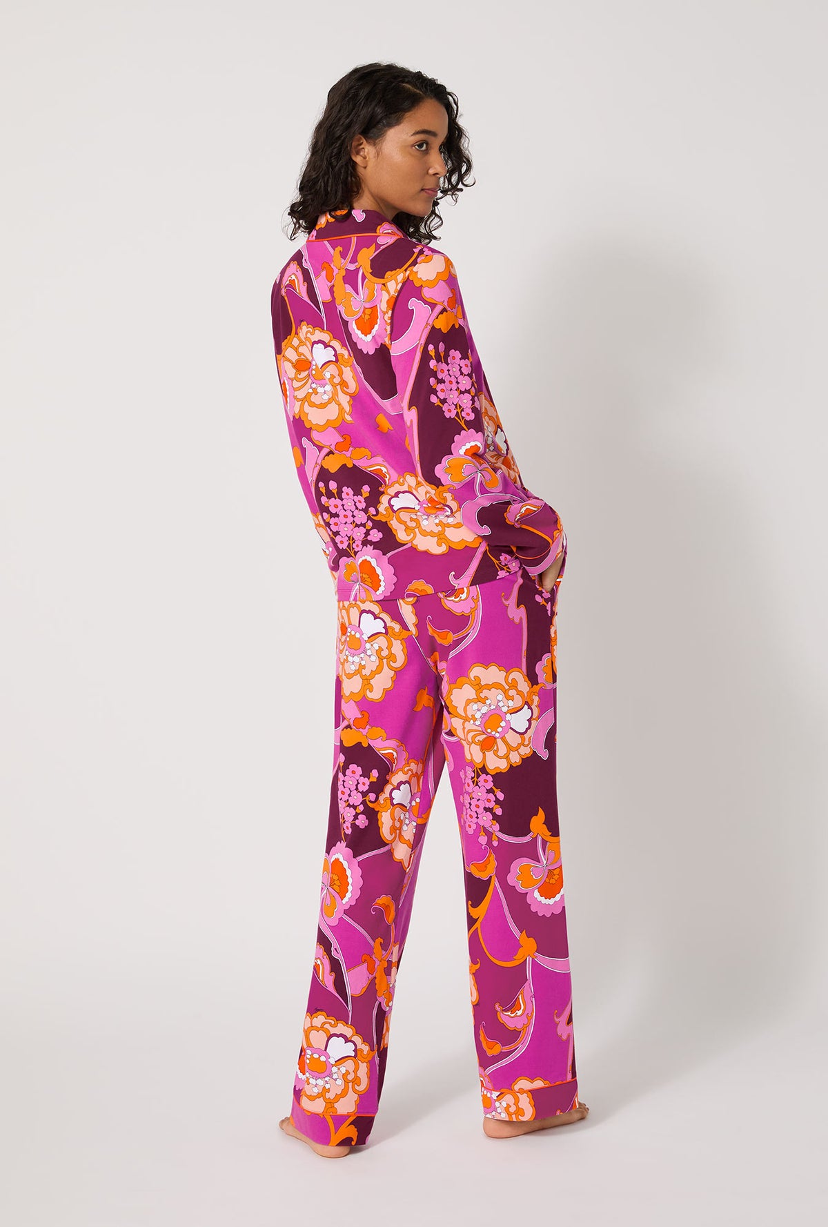 A lady wearing BedHead X Trina Turk Apache Plume Long Sleeve Classic Stretch Jersey Pj Set