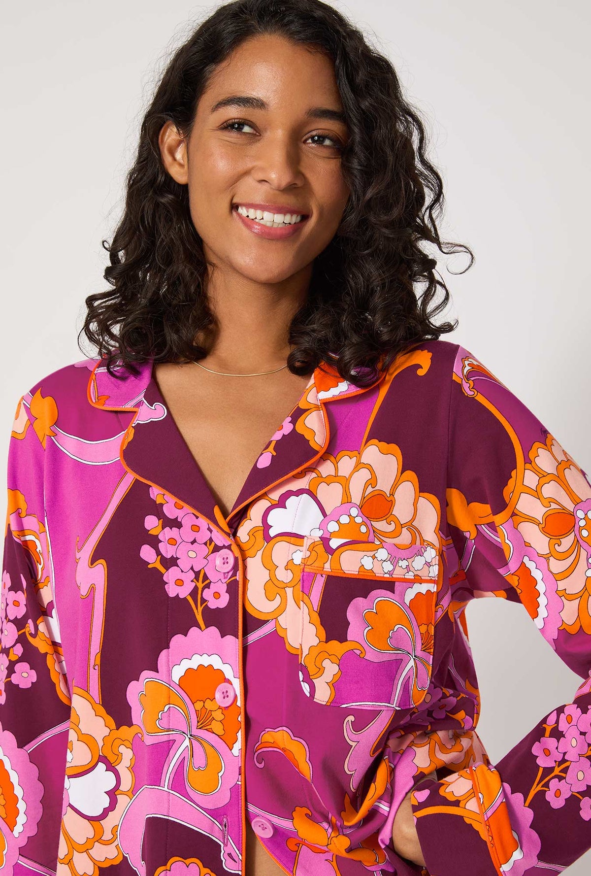 A lady wearing BedHead X Trina Turk Apache Plume Long Sleeve Classic Stretch Jersey Pj Set