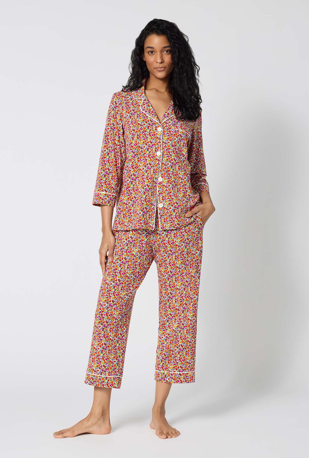 A lady wearing Ditsy Harvest 3/4 Sleeve Classic Stretch Jersey Cropped Pj Set
