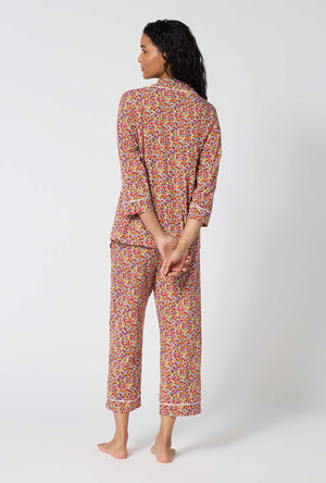 A lady wearing Ditsy Harvest 3/4 Sleeve Classic Stretch Jersey Cropped Pj Set back view