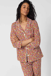 A lady wearing Ditsy Harvest 3/4 Sleeve Classic Stretch Jersey Cropped Pj Set closer look