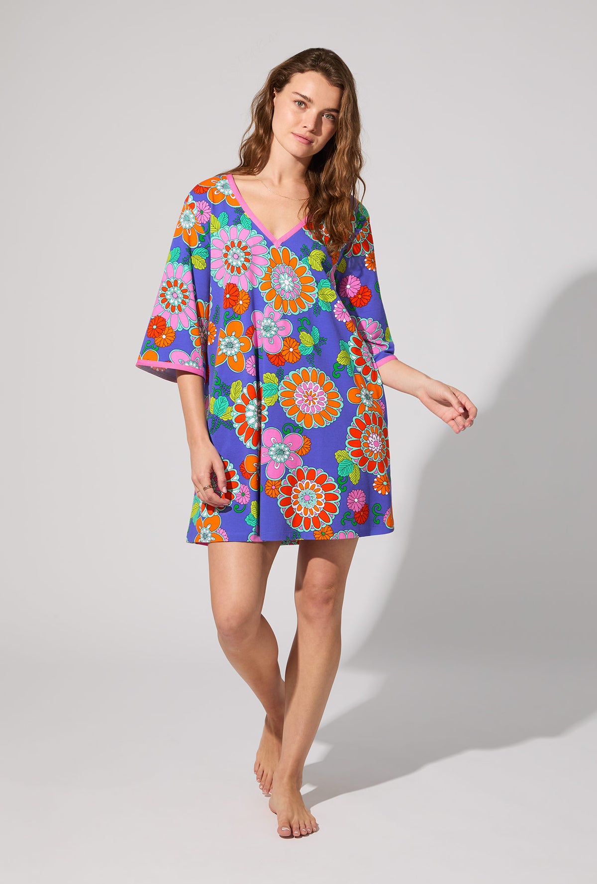 A lady wearing BedHead X Trina Turk Tokyo Floral 3/4 Sleeve Stretch Jersey Caftan