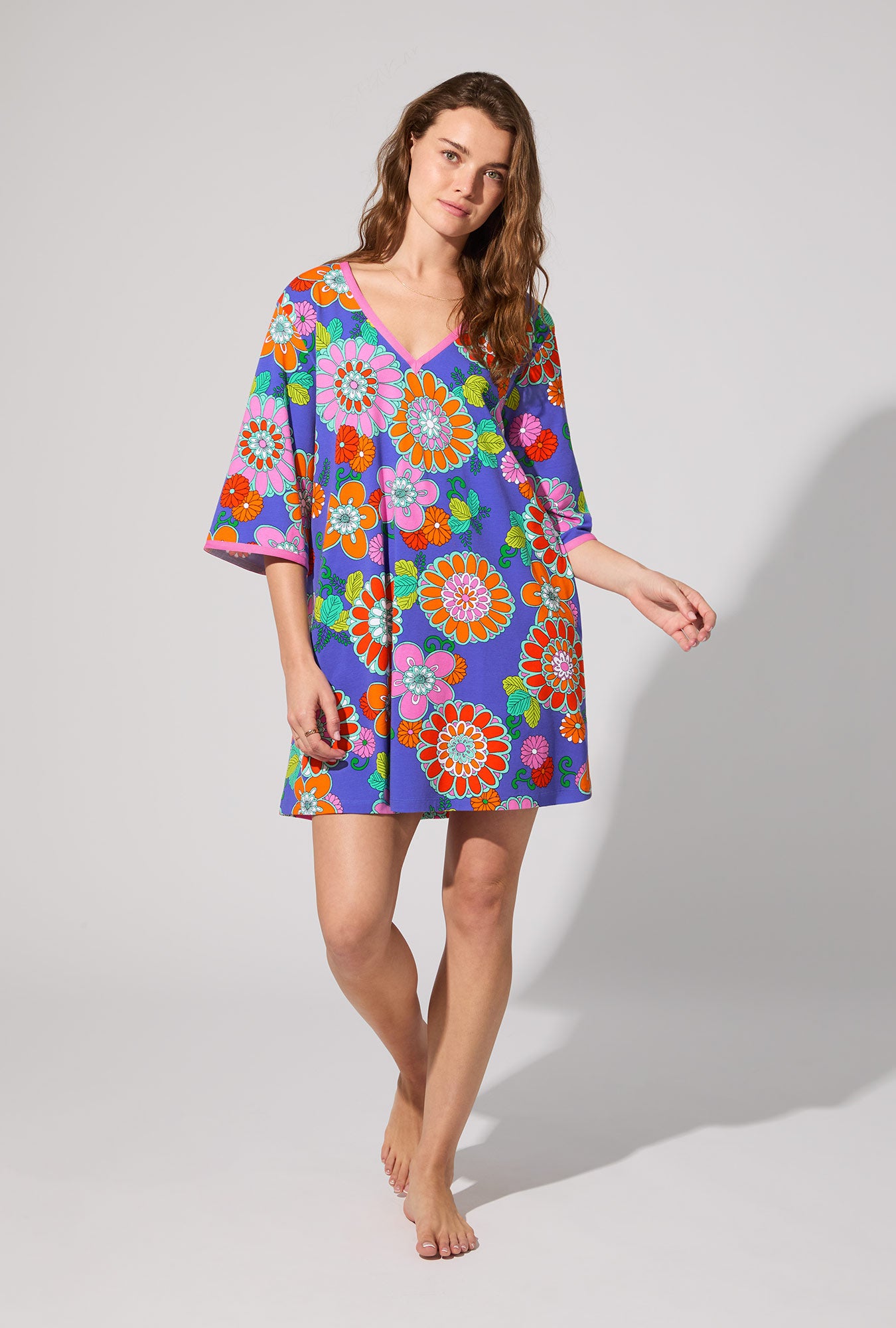 A lady wearing BedHead X Trina Turk Tokyo Floral 3/4 Sleeve Stretch Jersey Caftan
