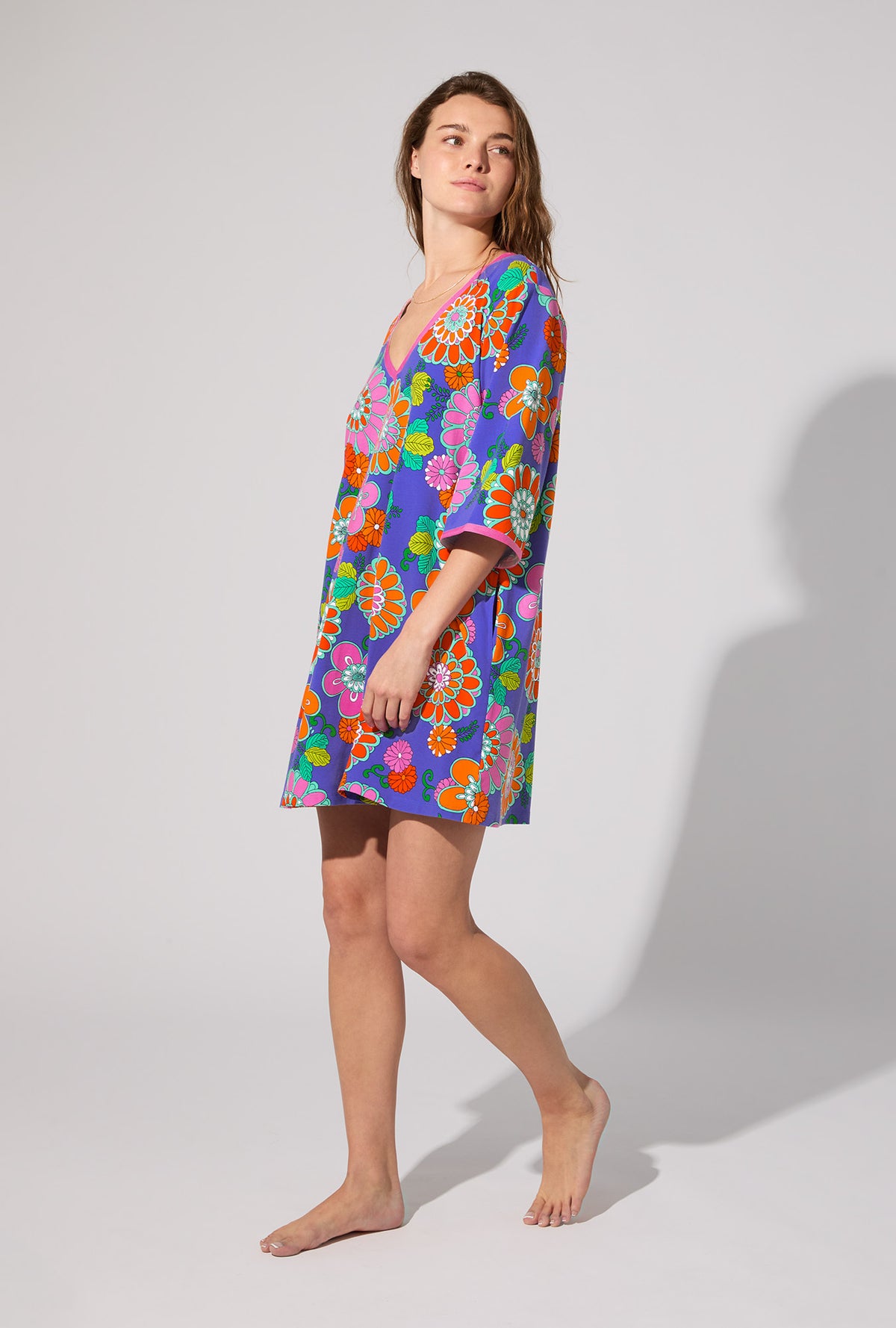 A lady wearing BedHead X Trina Turk Tokyo Floral 3/4 Sleeve Stretch Jersey Caftan