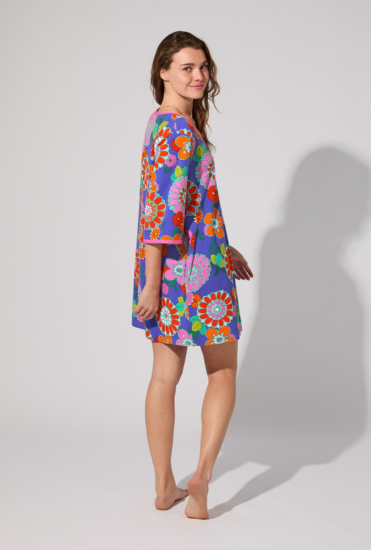 A lady wearing BedHead X Trina Turk Tokyo Floral 3/4 Sleeve Stretch Jersey Caftan