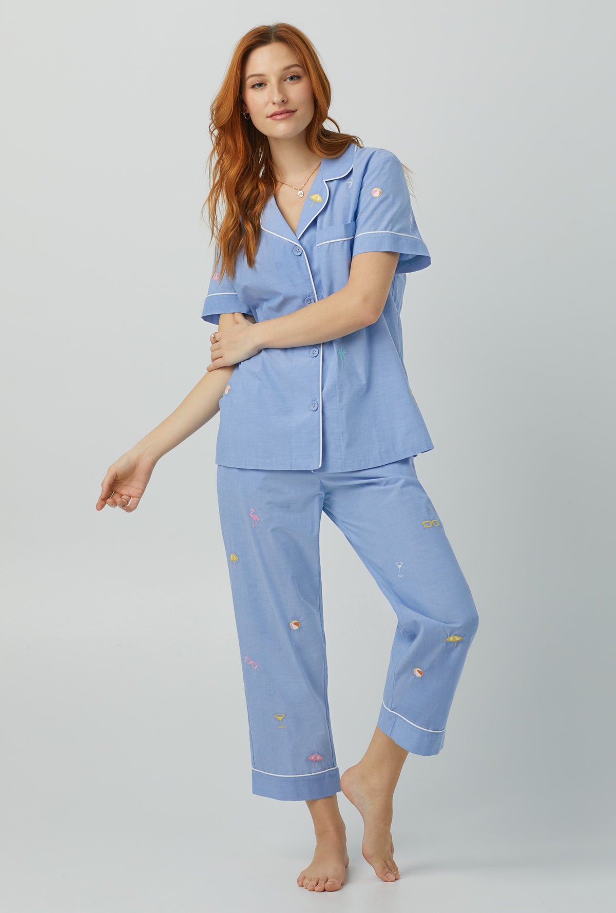 A lady wearing blue Short Sleeve Classic Woven Cotton Poplin Cropped PJ Set with Chambray print