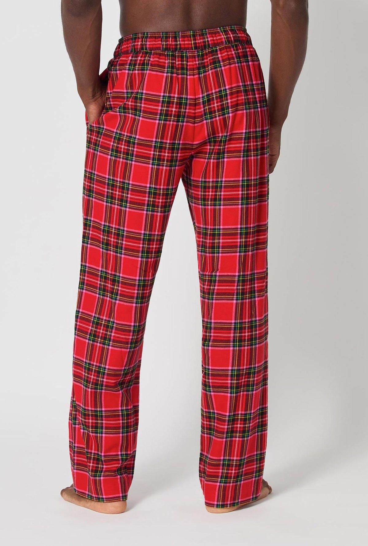 A man wearing BedHead X Mr. Turk Christmas Plaid Men&#39;s Woven Portuguese Flannel PJ Pant