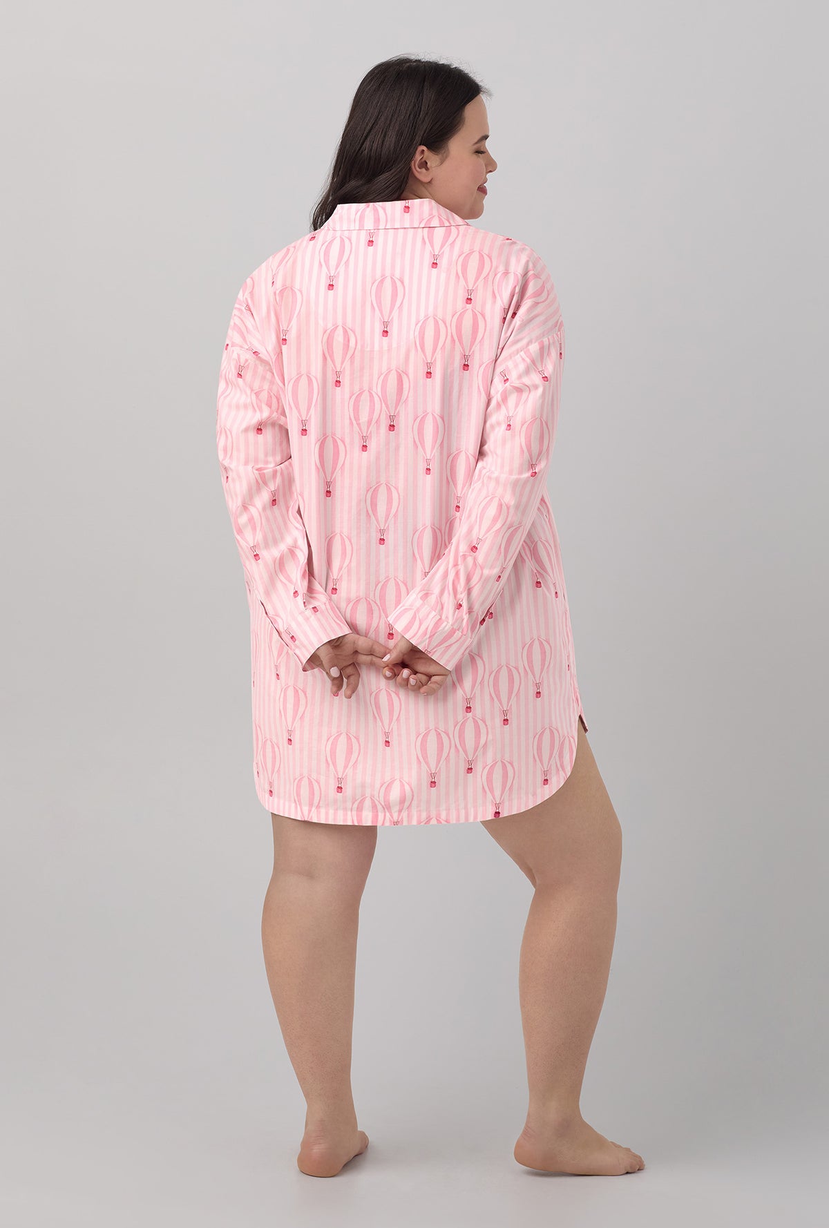 A lady wearing cotton poplin boyfriend shirt with balloon ride print