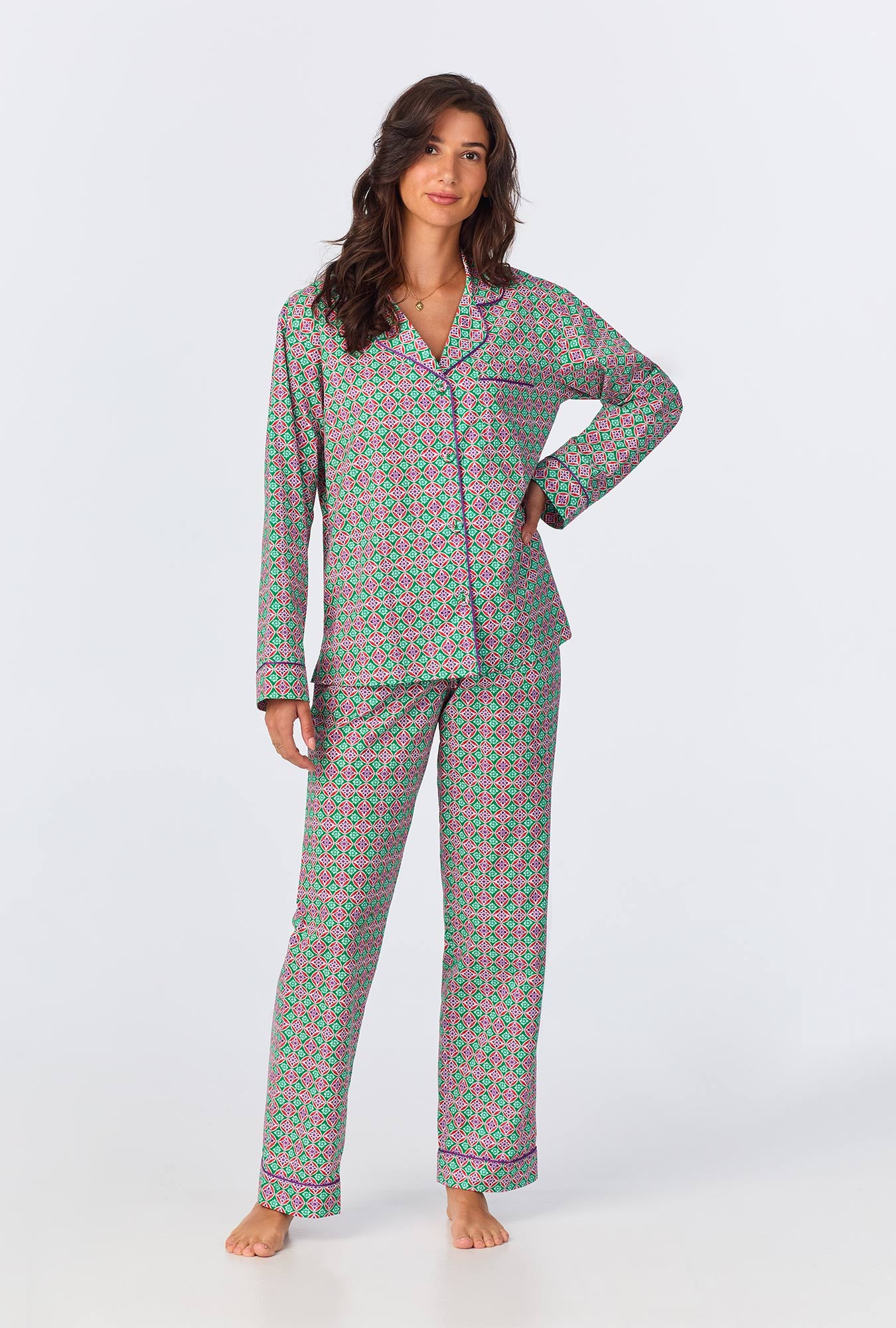 A lady wearing long sleeve classic woven cotton poplin long pj set with wonderland geo print