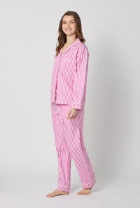 A lady wearing Pink Long Sleeve Classic Woven Cotton Sateen Pj Set side view