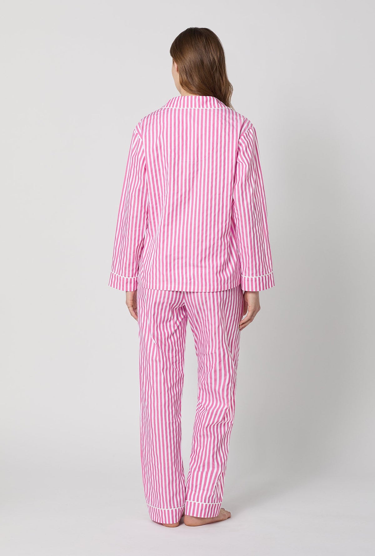 A lady wearing Pink Long Sleeve Classic Woven Cotton Sateen Pj Set back view