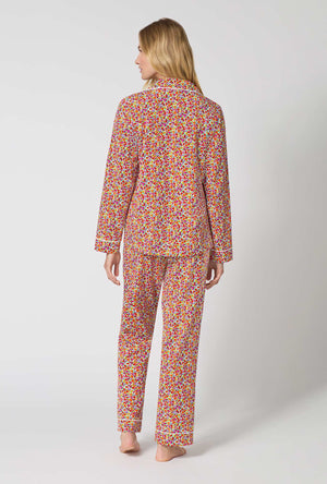 A lady wearing Ditsy Harvest Long Sleeve Classic Stretch Jersey Pj Set back view