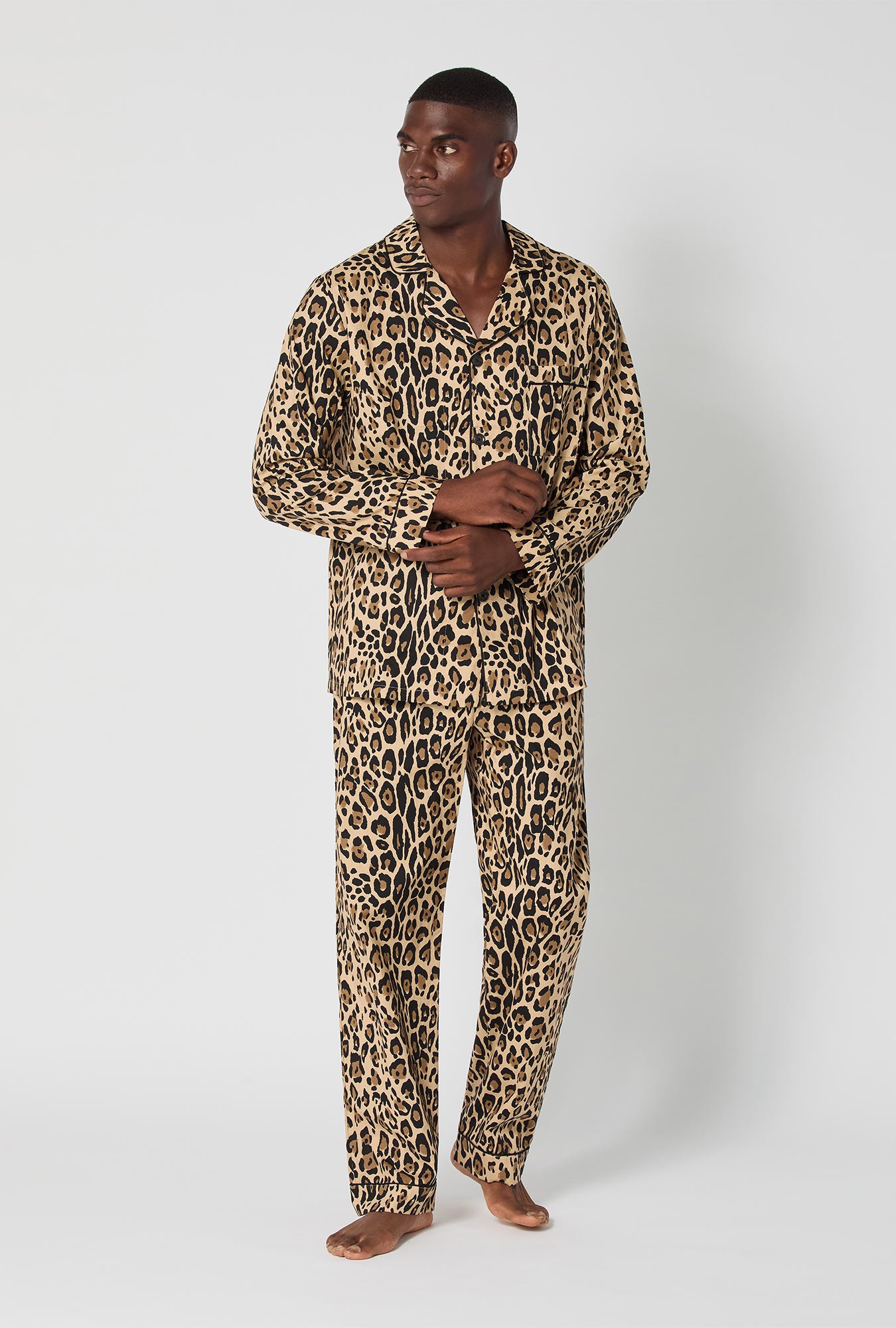 A man wearing BedHead X Mr. Turk Jaguar Stripe  Men's Short Sleeve Classic Woven Cotton Poplin Pj Set