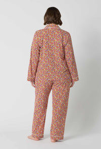 A lady wearing plus size Ditsy Harvest Long Sleeve Classic Stretch Jersey Pj Set back view