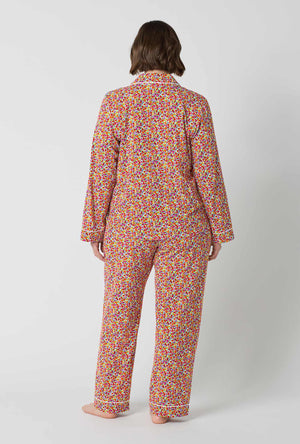 A lady wearing plus size Ditsy Harvest Long Sleeve Classic Stretch Jersey Pj Set back view