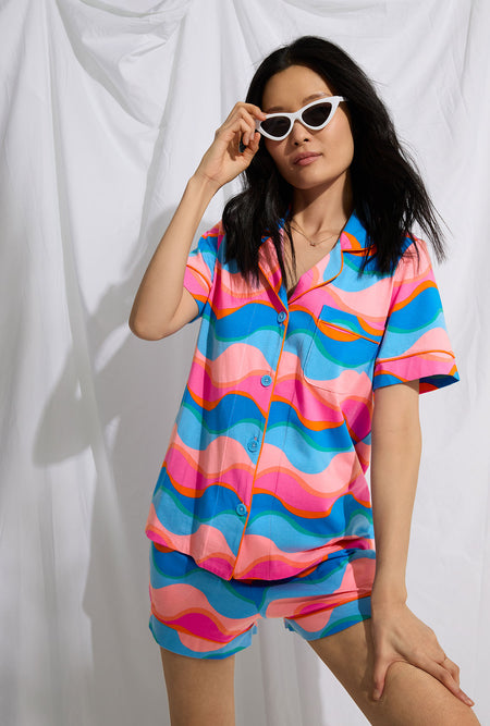 A lady wearing short sleeve shorty stretch jersey pj set with new wave print