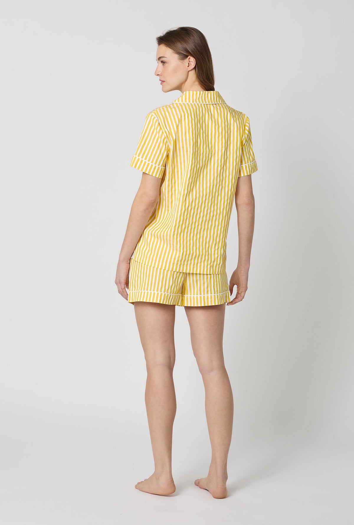 A lady wearing Yellow Short Sleeve Classic Shorty Woven Cotton Sateen Pj Set back view