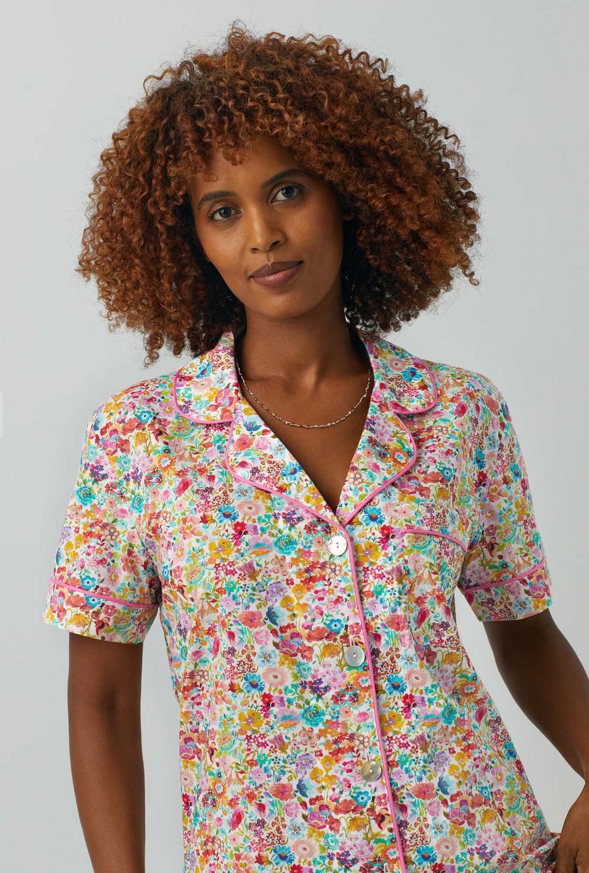 A lady wearing  multi color short Sleeve Classic Woven Cotton PJ Set with Classic Meadow print